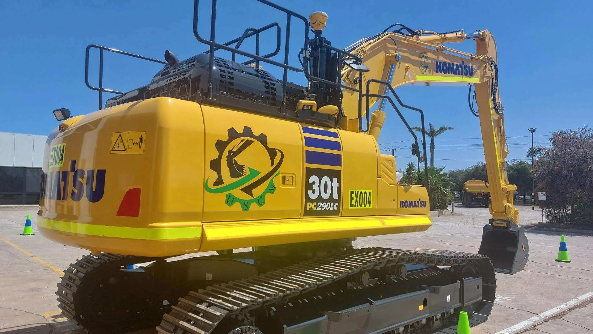 Heavy excavator moving earth on an early-stage project