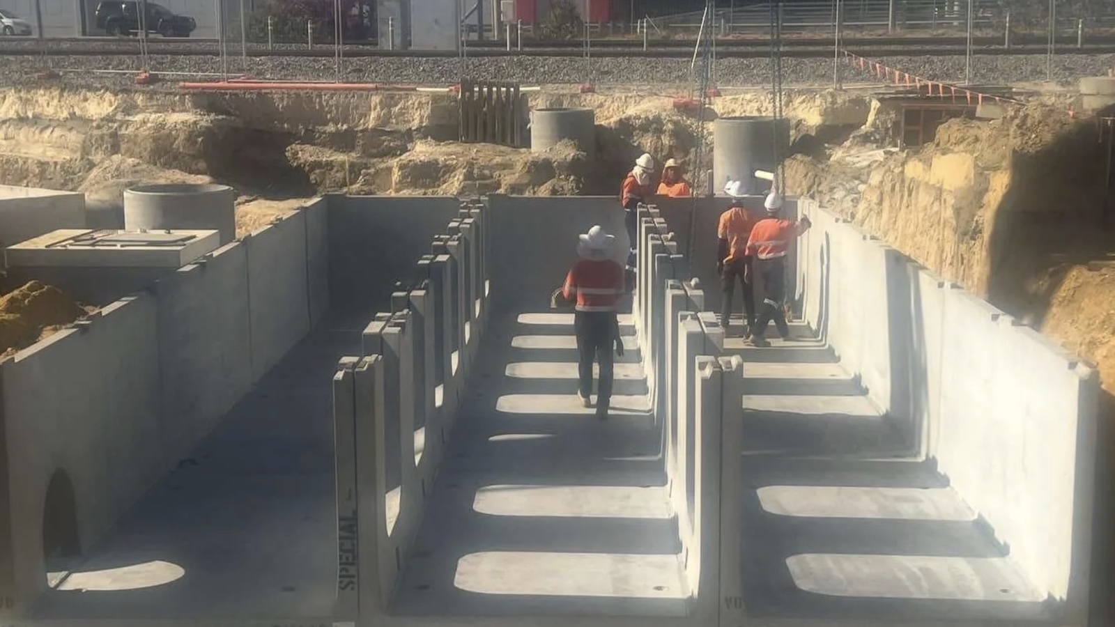 USCM crew in hi-vis on an active civil construction site
