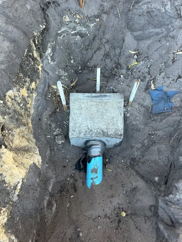 Water main pipe install in congested Henley Brook services corridor