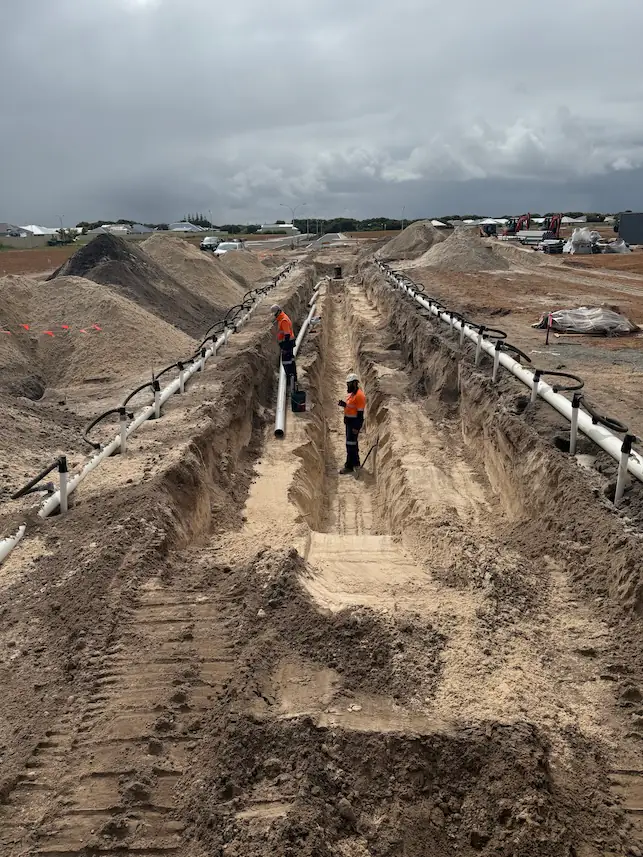 Sewer pipe installation in coastal sand at Beachridge Estate