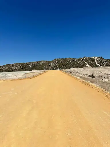 Road crew grading and site preparation at Elavale